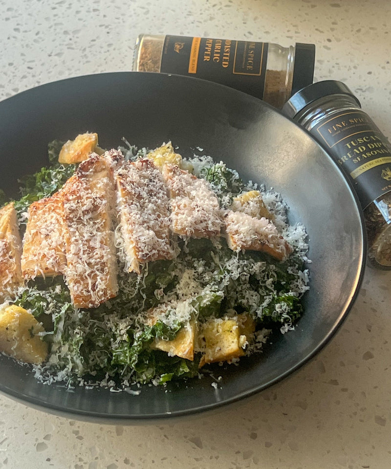Kale Caesar Salad with Roasted Garlic Pepper Chicken — made with Fine Spice Roasted Garlic Pepper